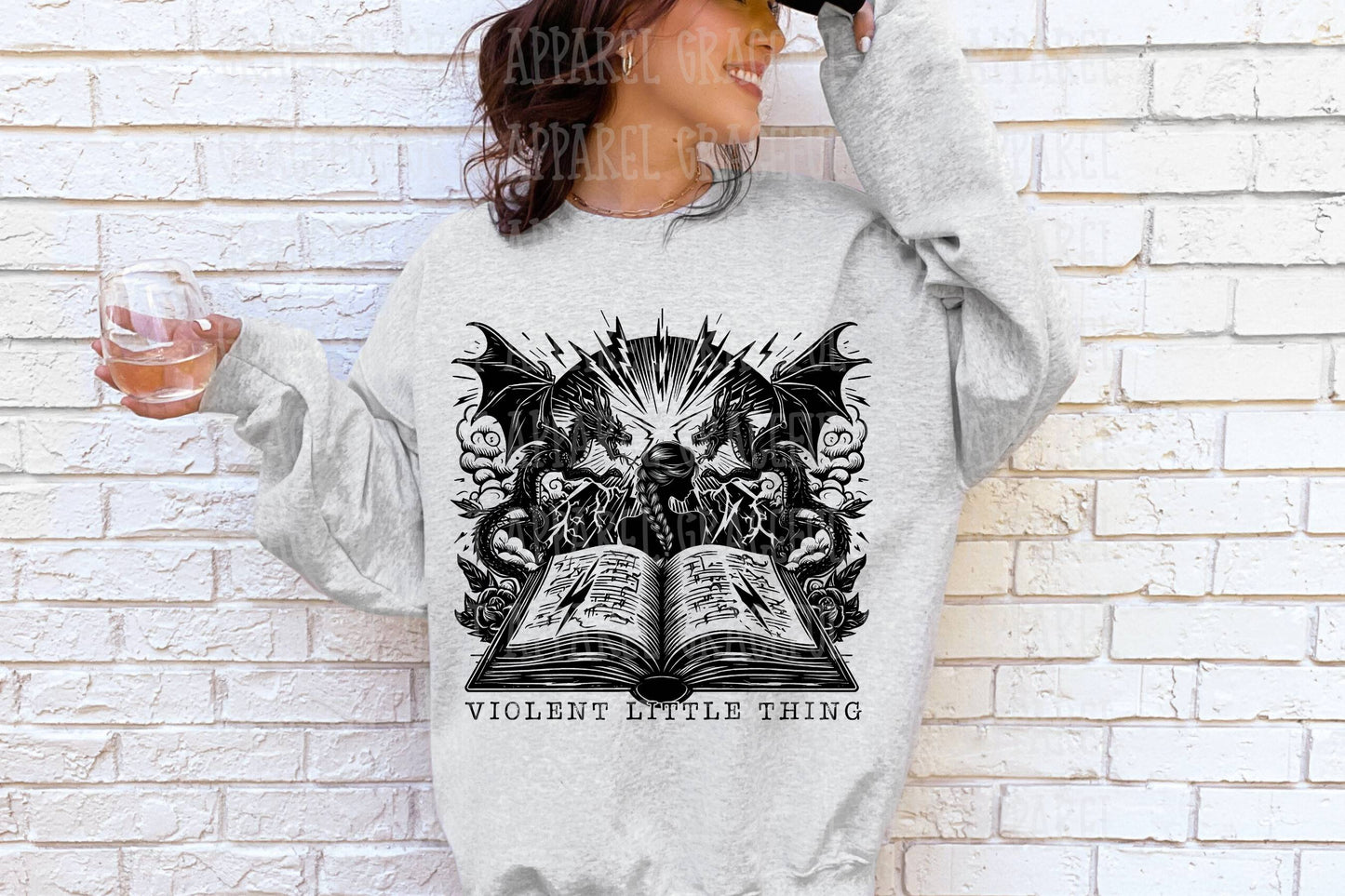Violent little thing with book